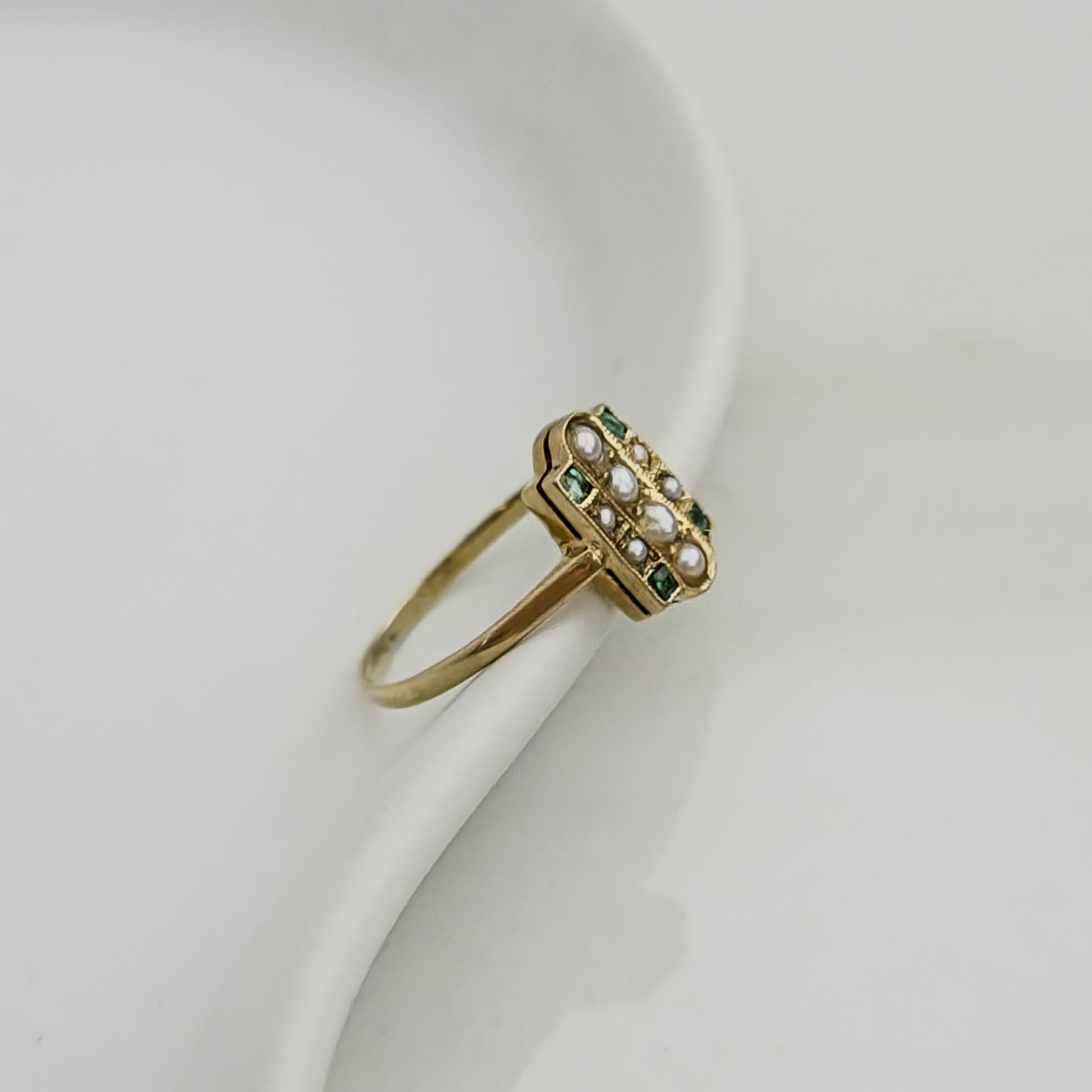 Antique gold ring with blue gemstone