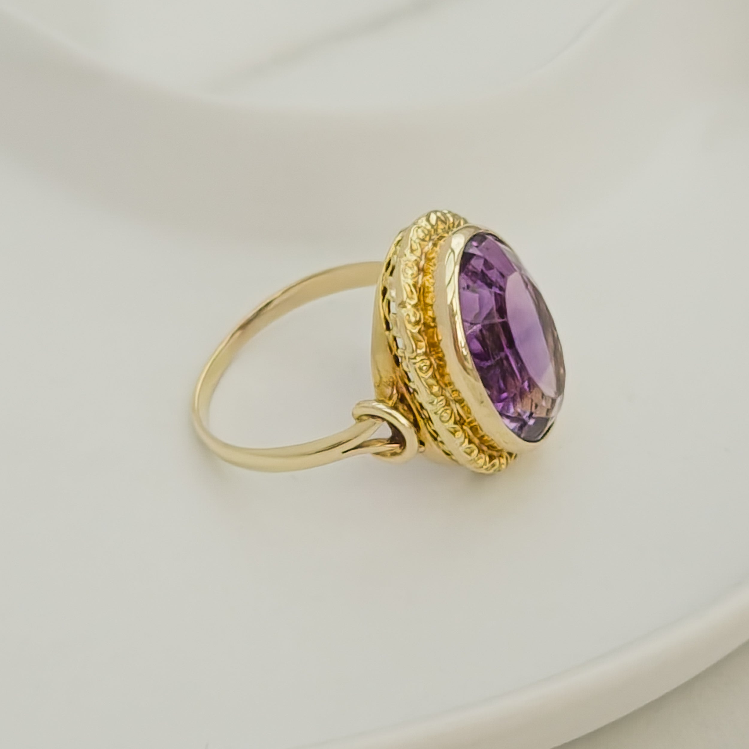 Antique gold ring with blue gemstone