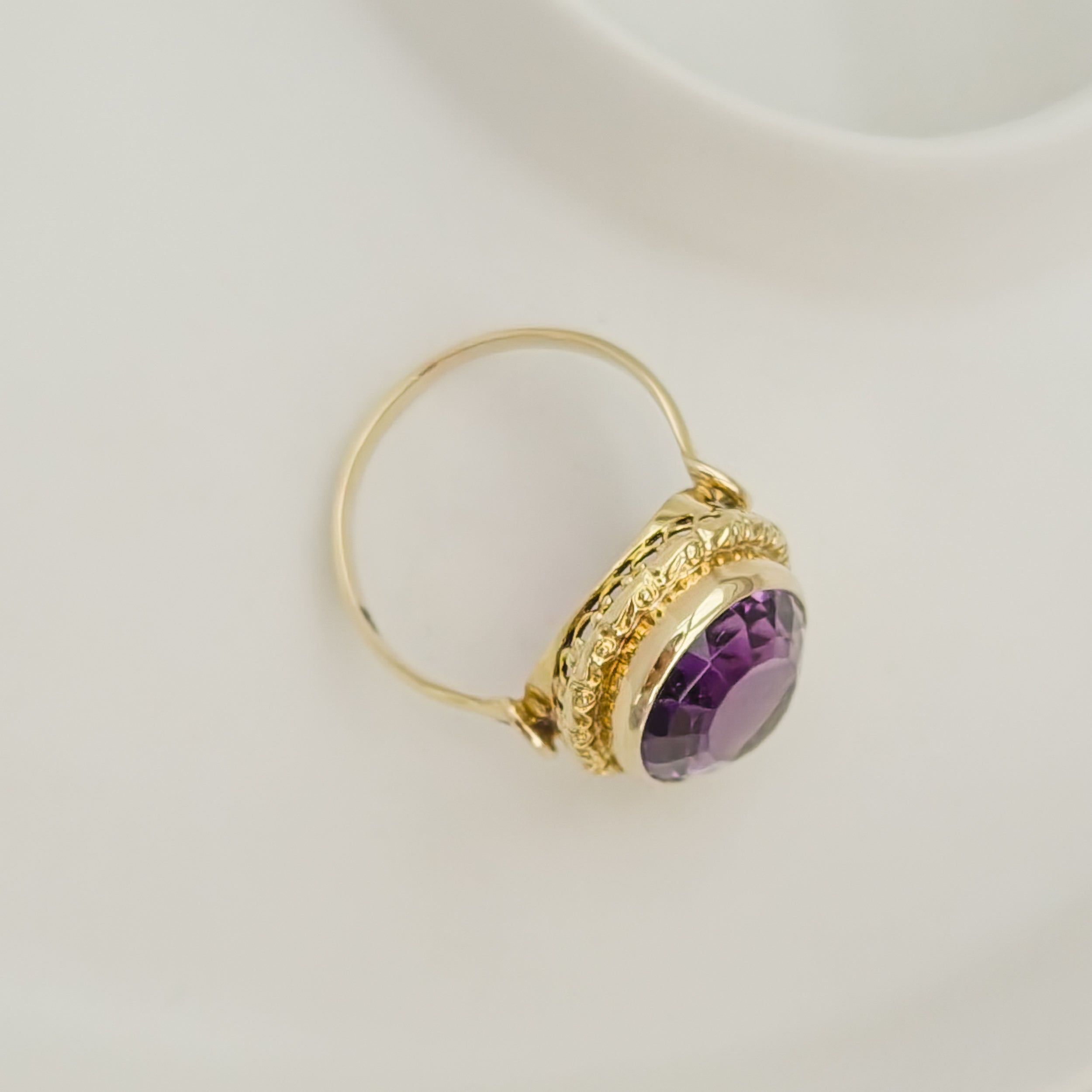 Antique gold ring with blue gemstone