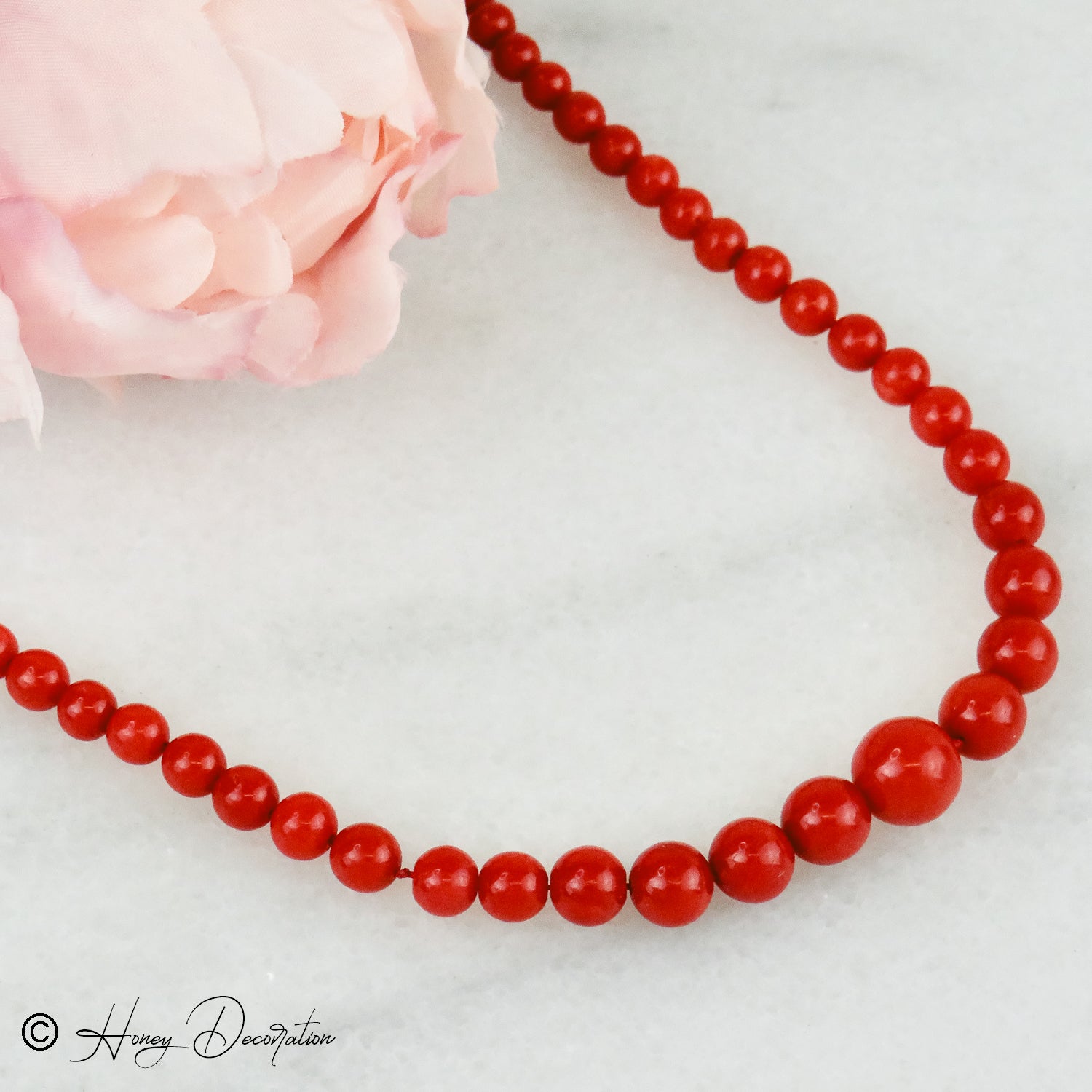 Coral chain with luxurious 18 karat gold closure