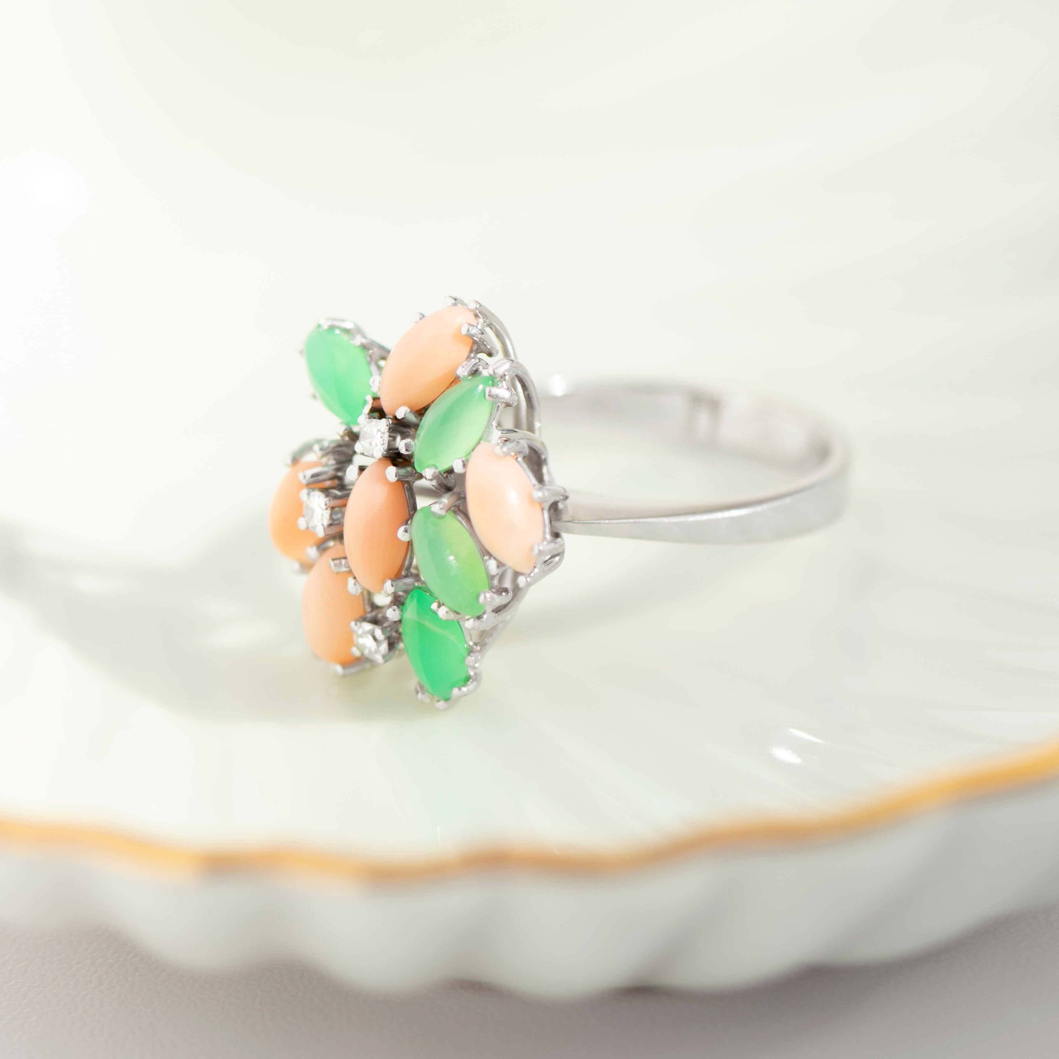 Layered marquise-cut stone detail on white gold band