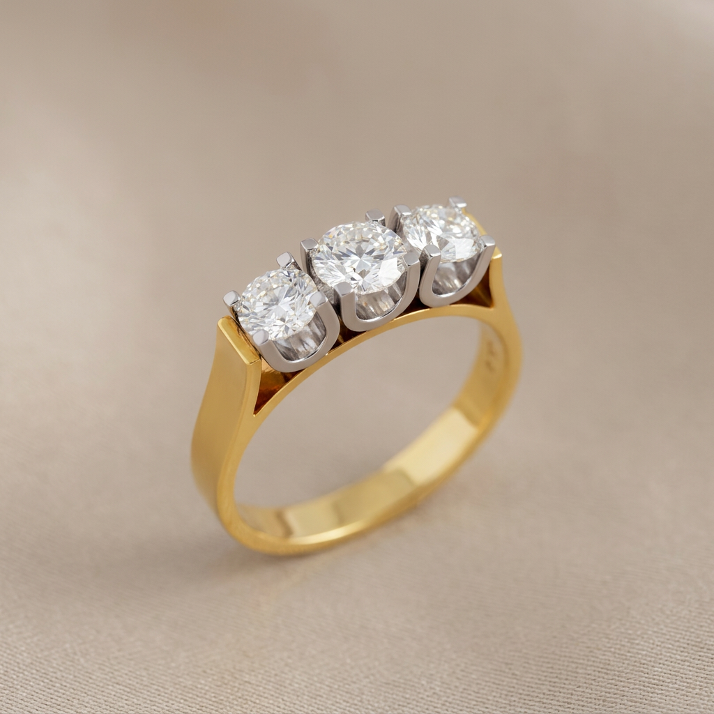 Side view of vintage 1970s three-stone diamond ring in yellow and white gold