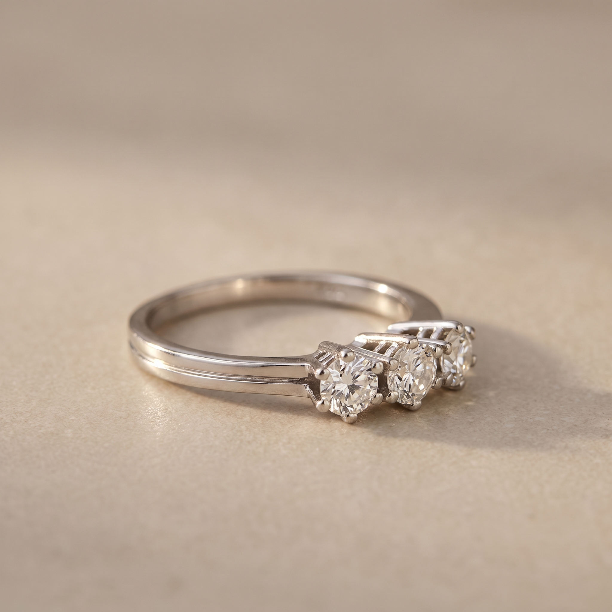 Trilogy ring in 14K white gold with 3 diamonds – past, present & future in one ring