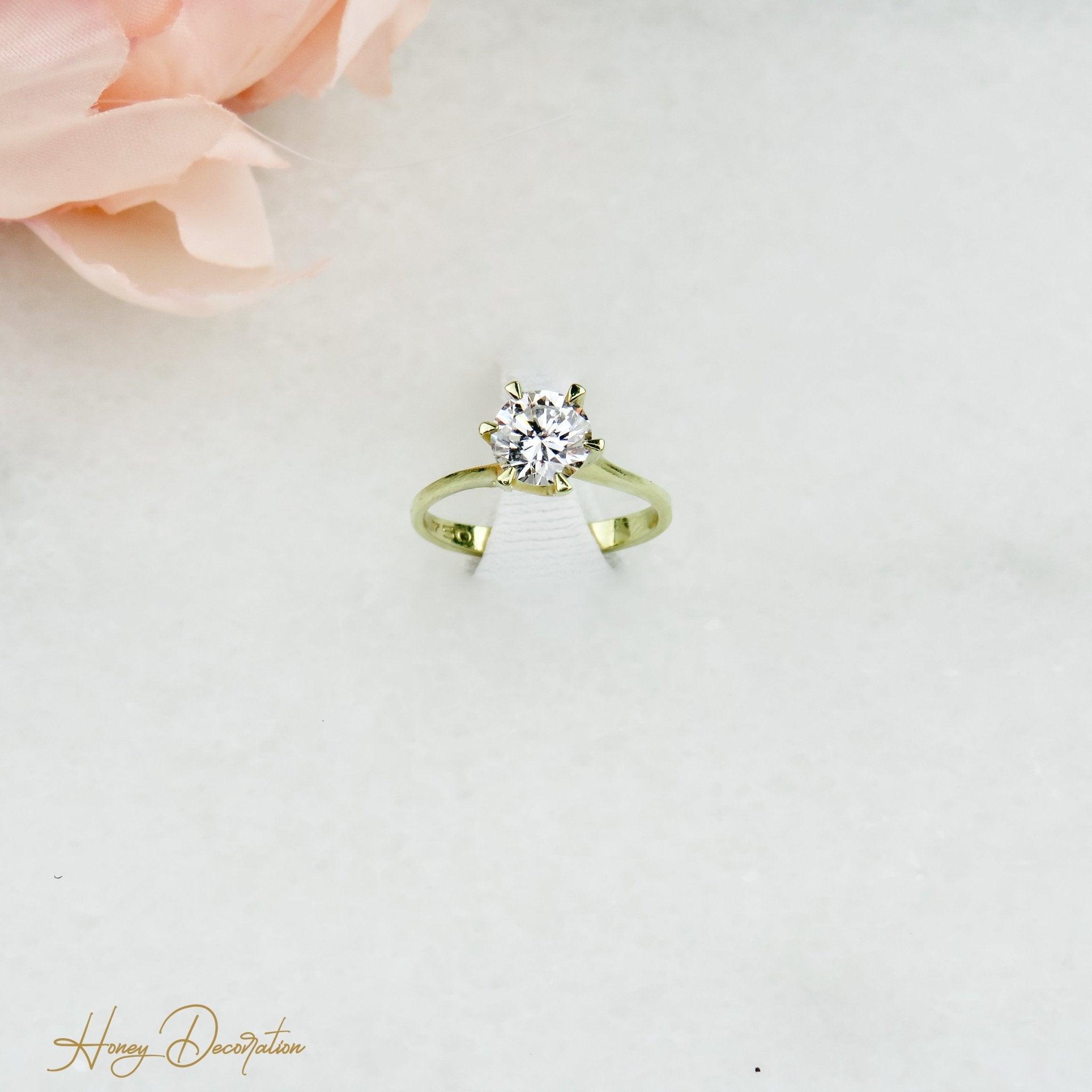 Exklusiver Goldring mit 1-Karäter - Honey Decoration