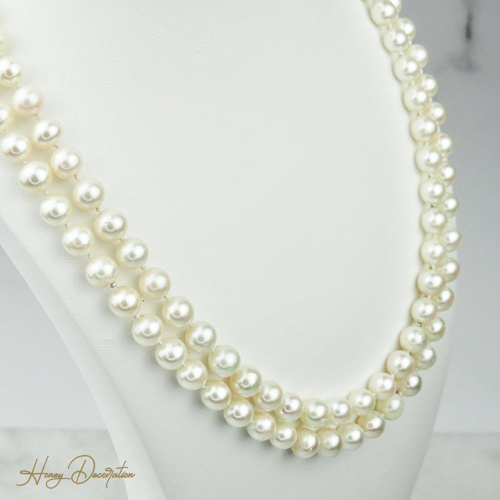 Lange Perlenkette mit 585 Weißgoldschließe - Honey Decoration