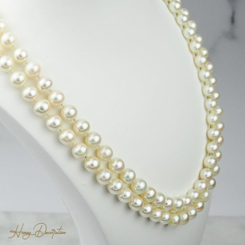 Lange Perlenkette mit 585 Weißgoldschließe - Honey Decoration