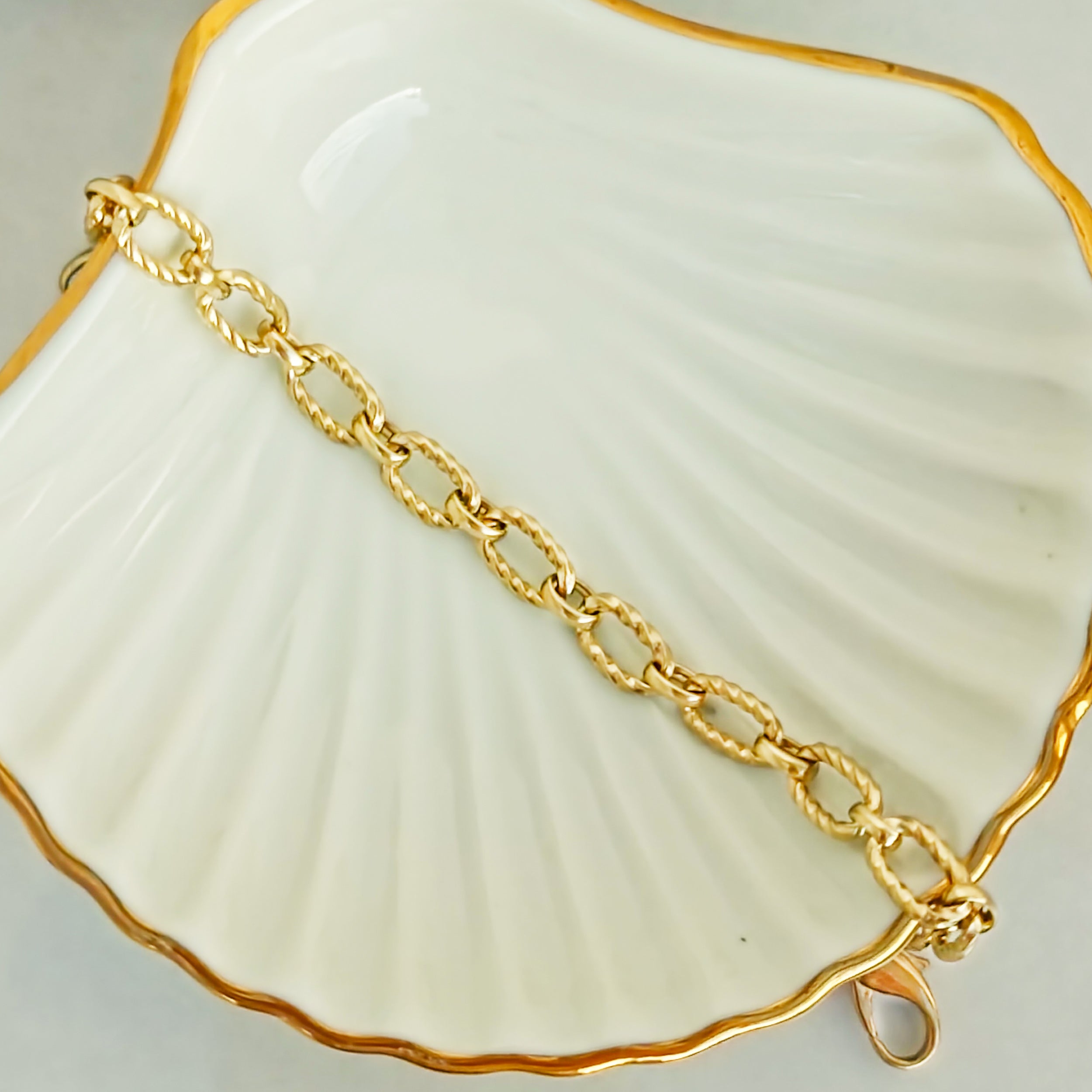Gedrehtes Rundanker-Armband aus 8 K Gold