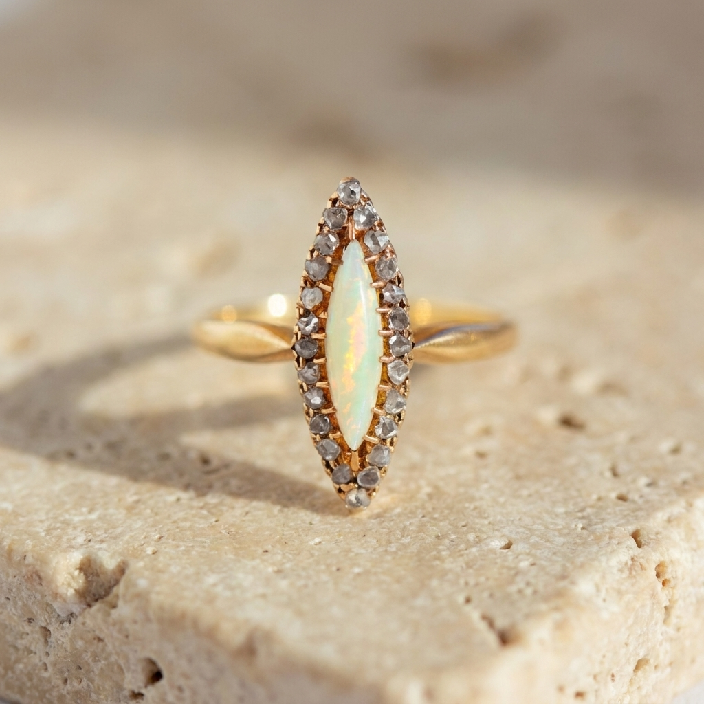 Edwardian yellow gold navette ring with opal and rose-cut diamonds