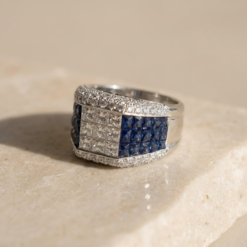 White gold ring with sapphires and diamonds in princess cutting