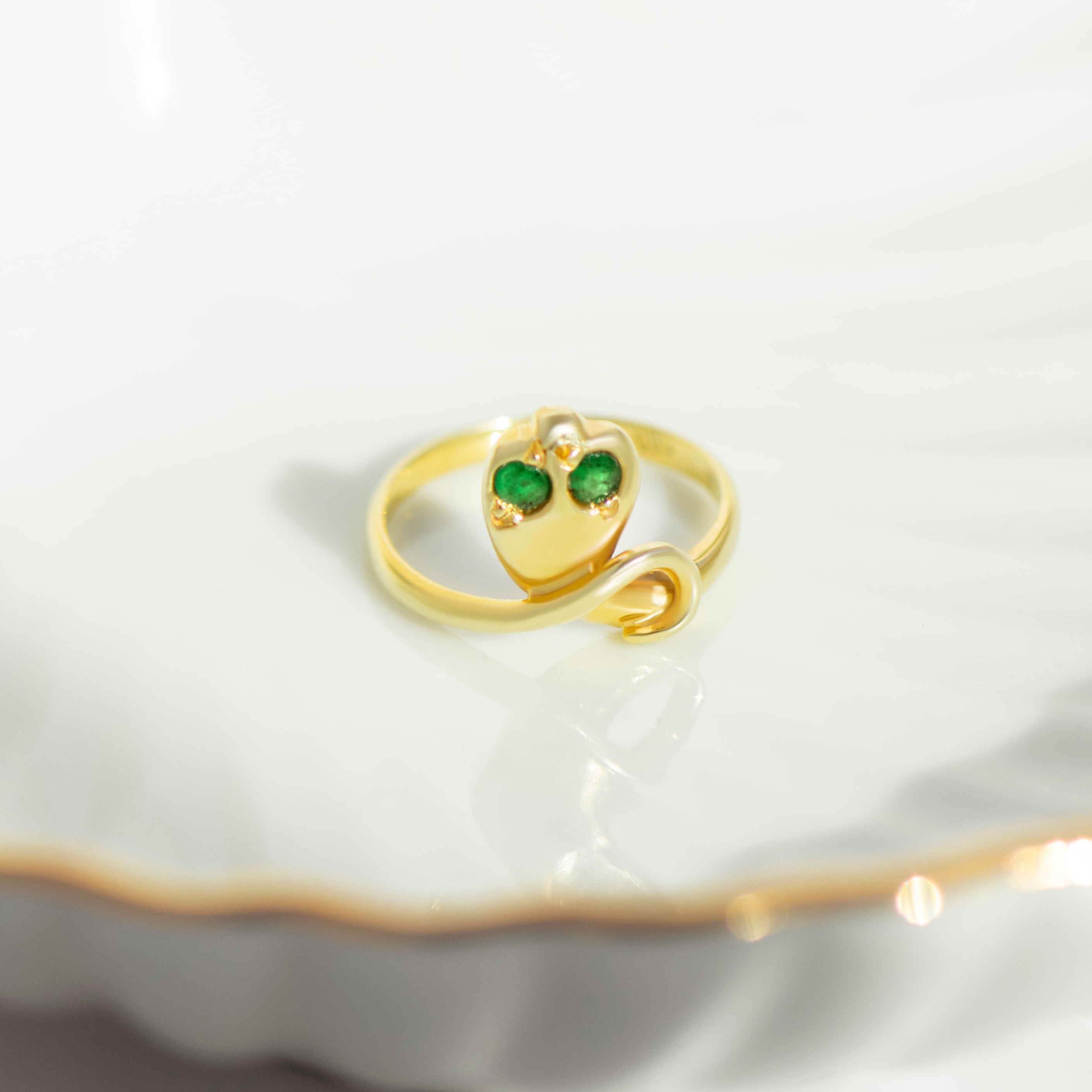 Schlangenring – Smaragdaugen – 585er Gelbgold