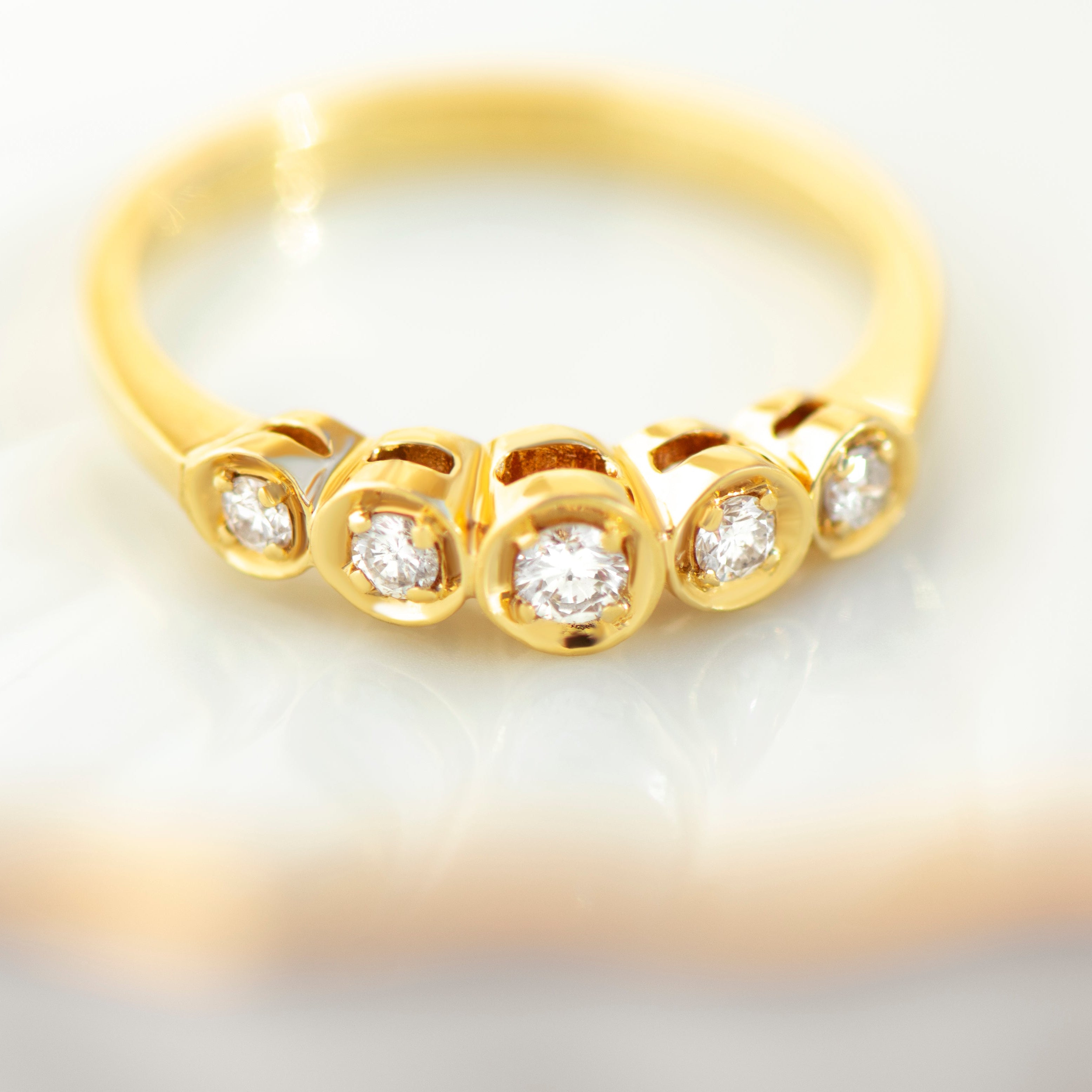 Fünfstein-Diamantring aus 750er Gelbgold