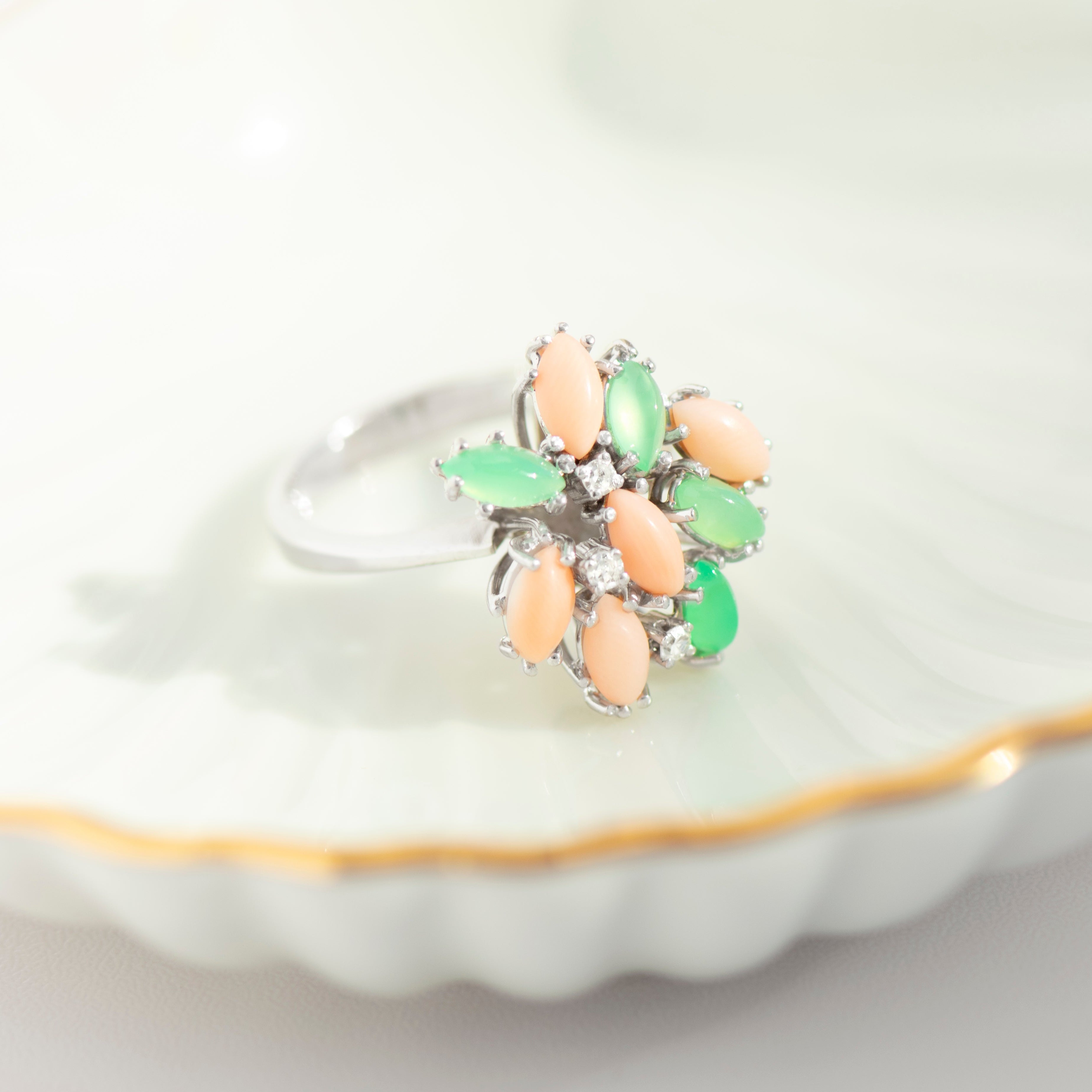 Side view of sculptural white gold floral ring