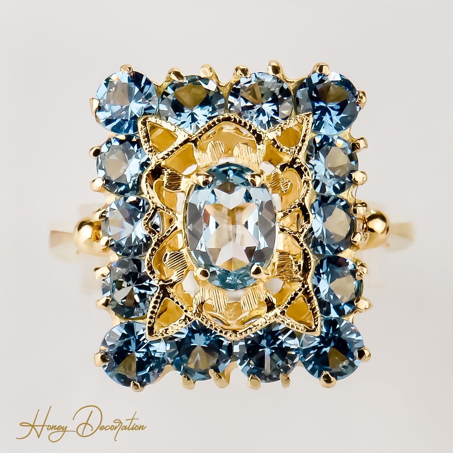 Vintage Goldring aus 18 Karat Gelbgold besetzt mit blauen Edelsteinen - Honey Jewelry